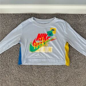 Nike Women’s Logo Long Sleeve Cropped Shirt in Blue/ multicolor, size S